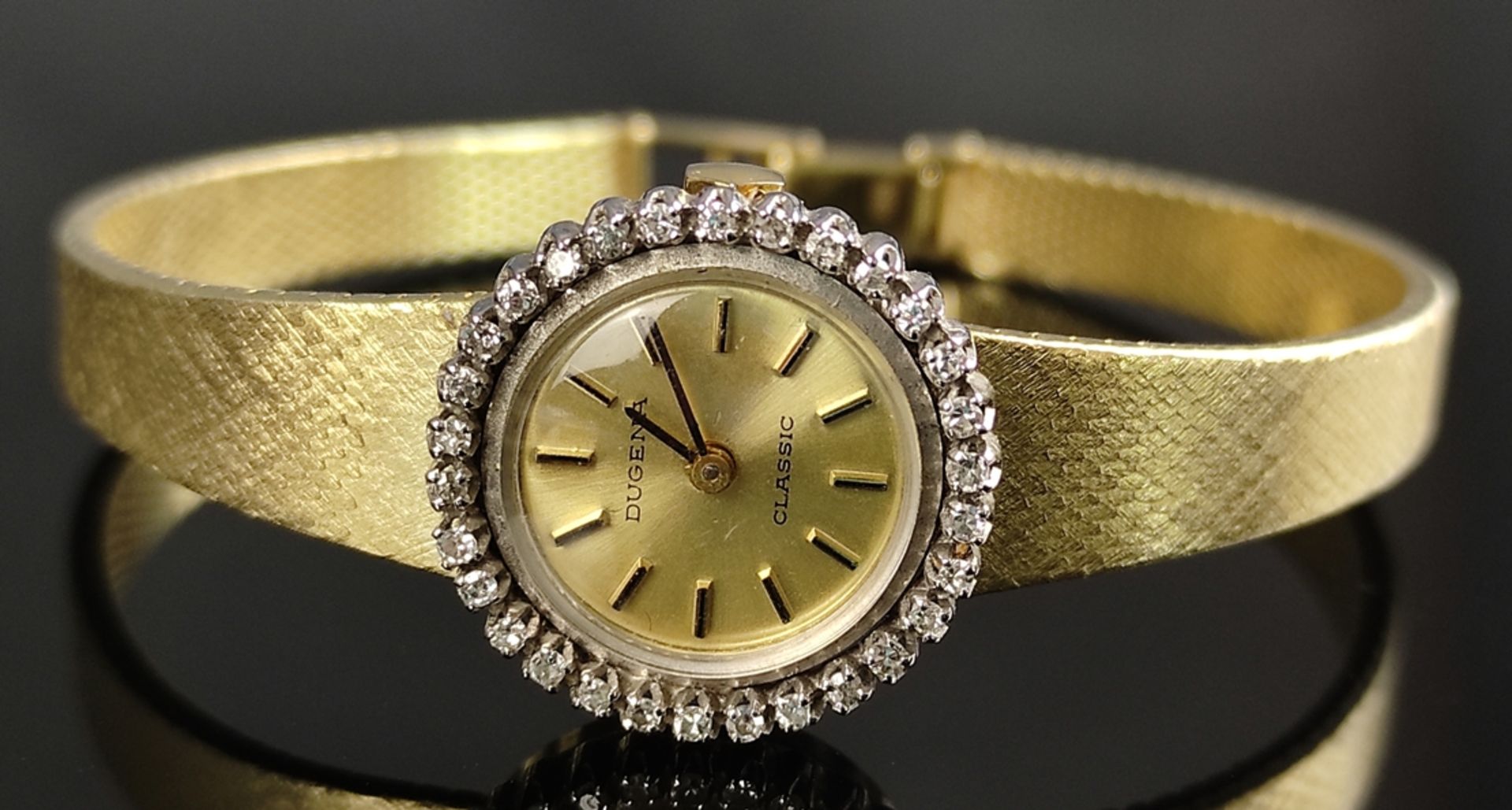 Damenarmbanduhr, Dugena Classic, Uhr gepunzt 585/14K Gelbgold, runde Lunette besetzt mit 30 kleinen