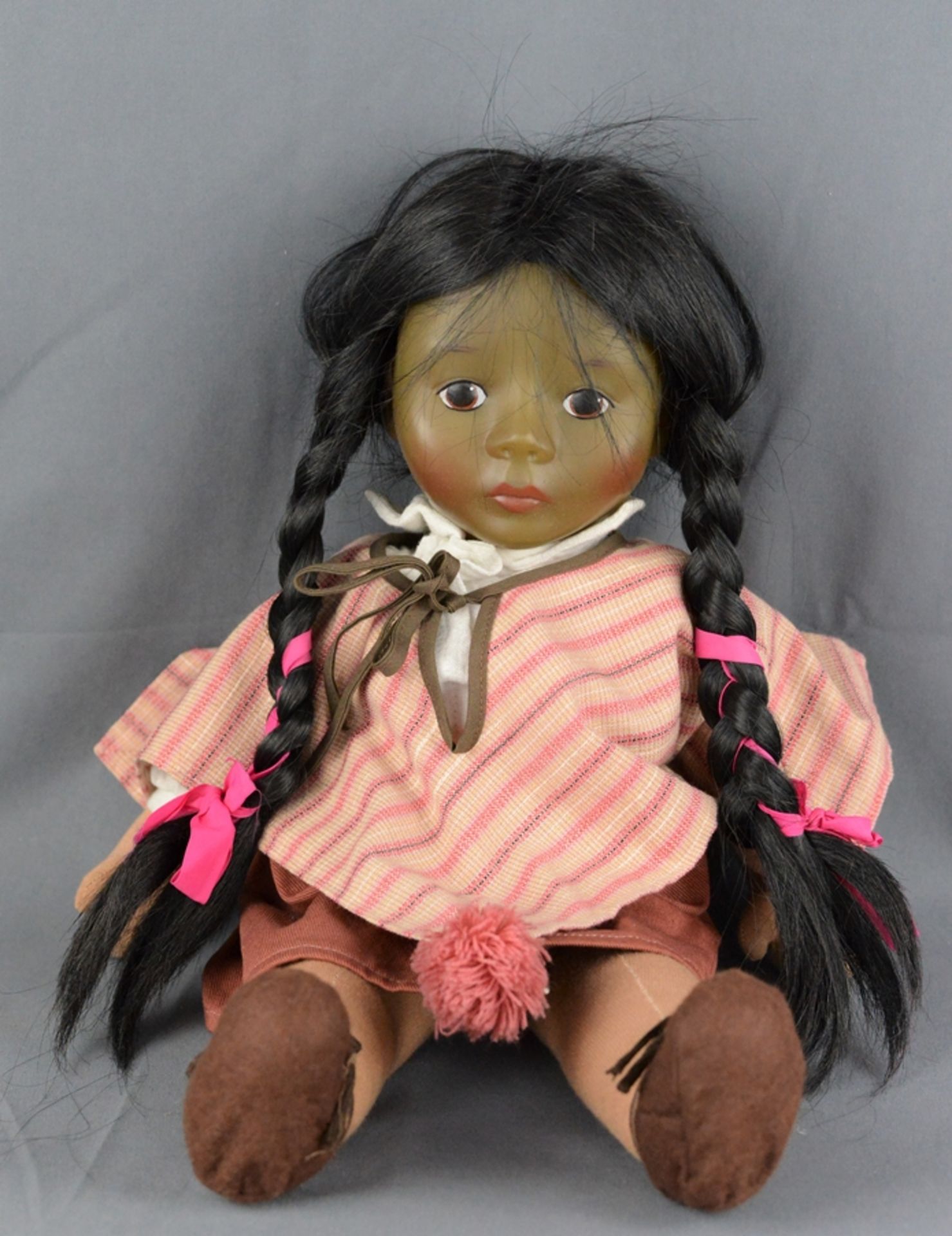 Doll, Creation Marie-Luise, head made of plastic, black hair braided into two pigtails, with stripe