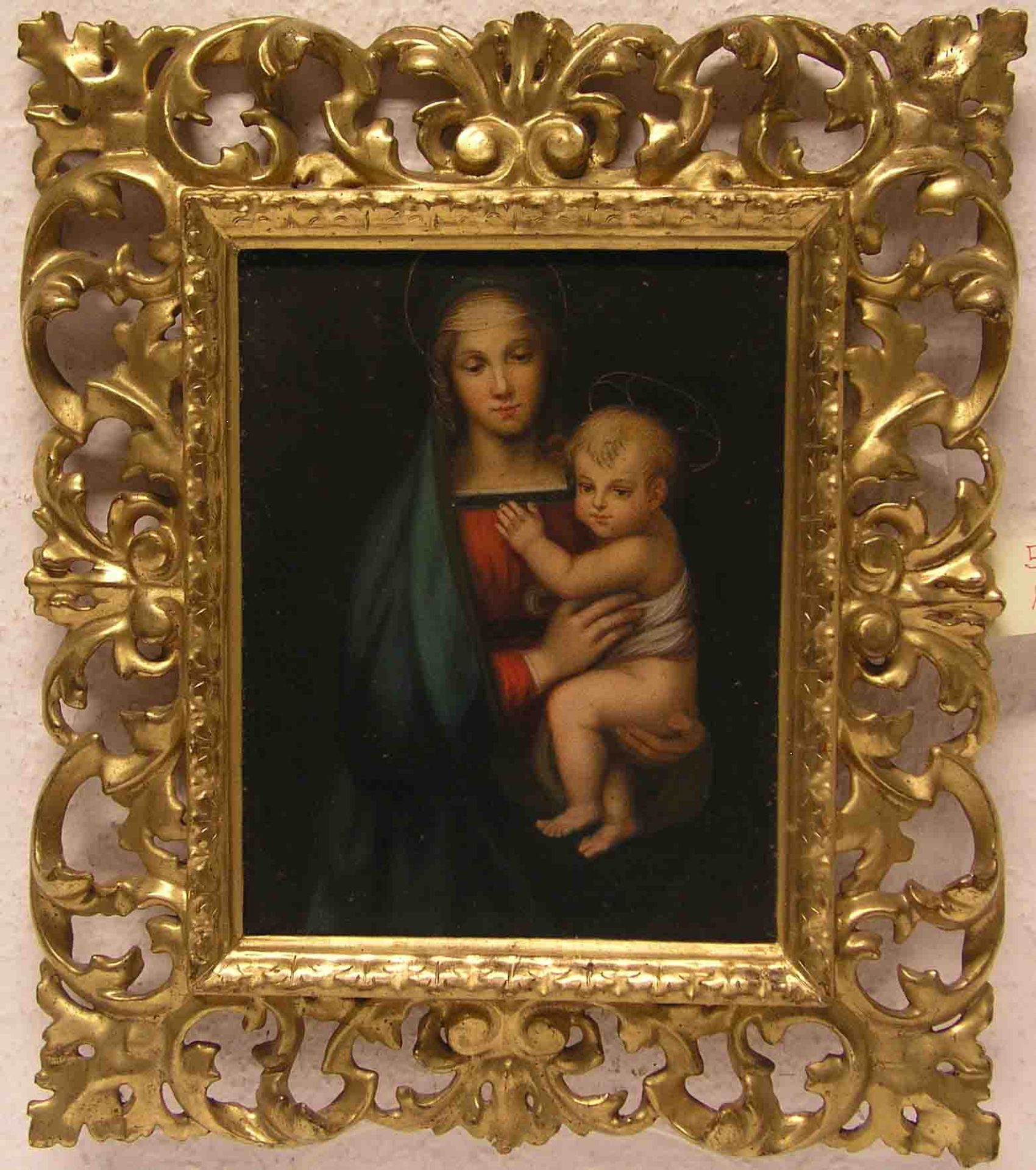 "Madonna mit Kind". Ölfarbdruck auf Leinwand, 22 x 17cm, sehr dekorativer, geschnitzterRahmen.