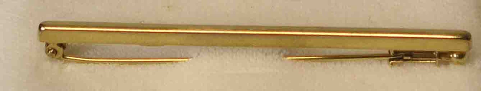 Krawattennadel. 8 Kt. Gold. Länge: 5,5cm, 1,3 Gramm.