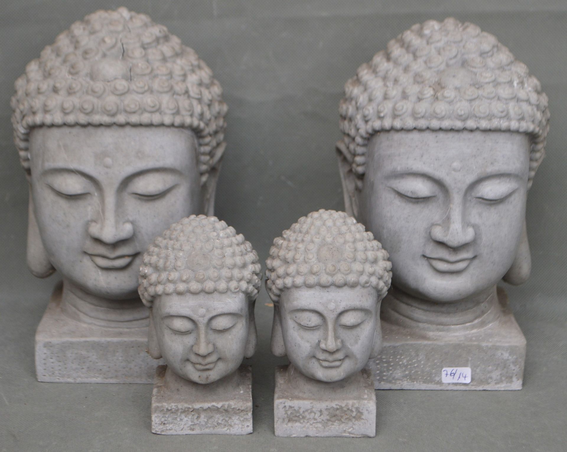 Konvolut vier Buddhaköpfe
