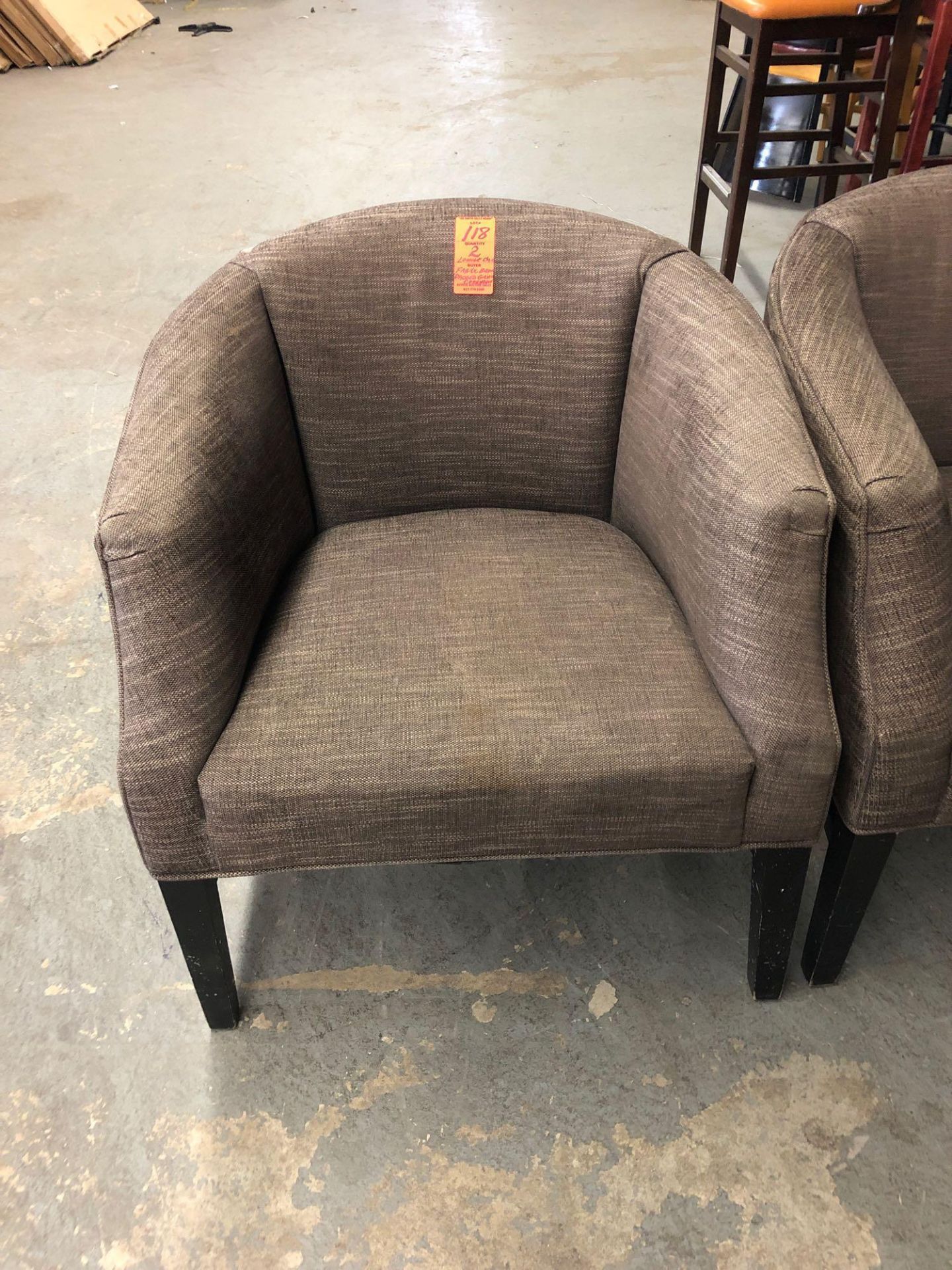 Curved back fabric lounge chair brown