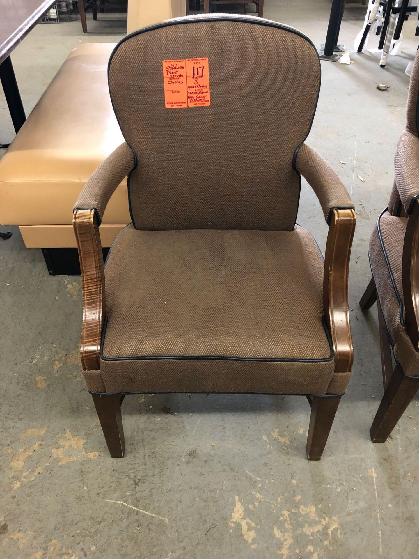 Wood frame chair with fabric upholstered seat brown