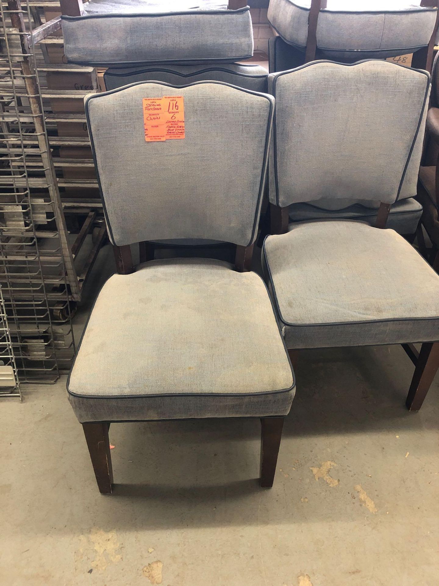 Wood chair with blue gray fabric seat and back