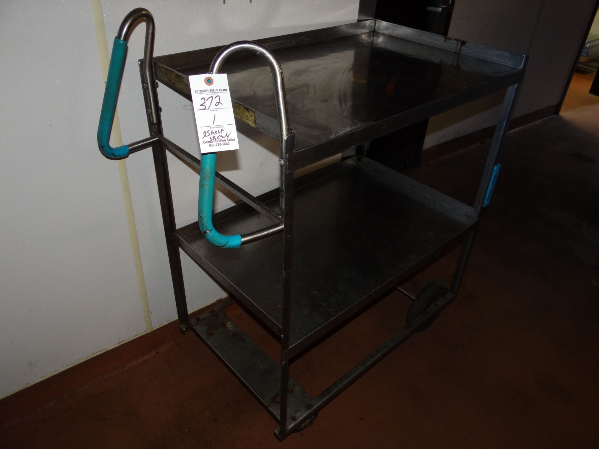 (1) Two Shelf Rolling Cart