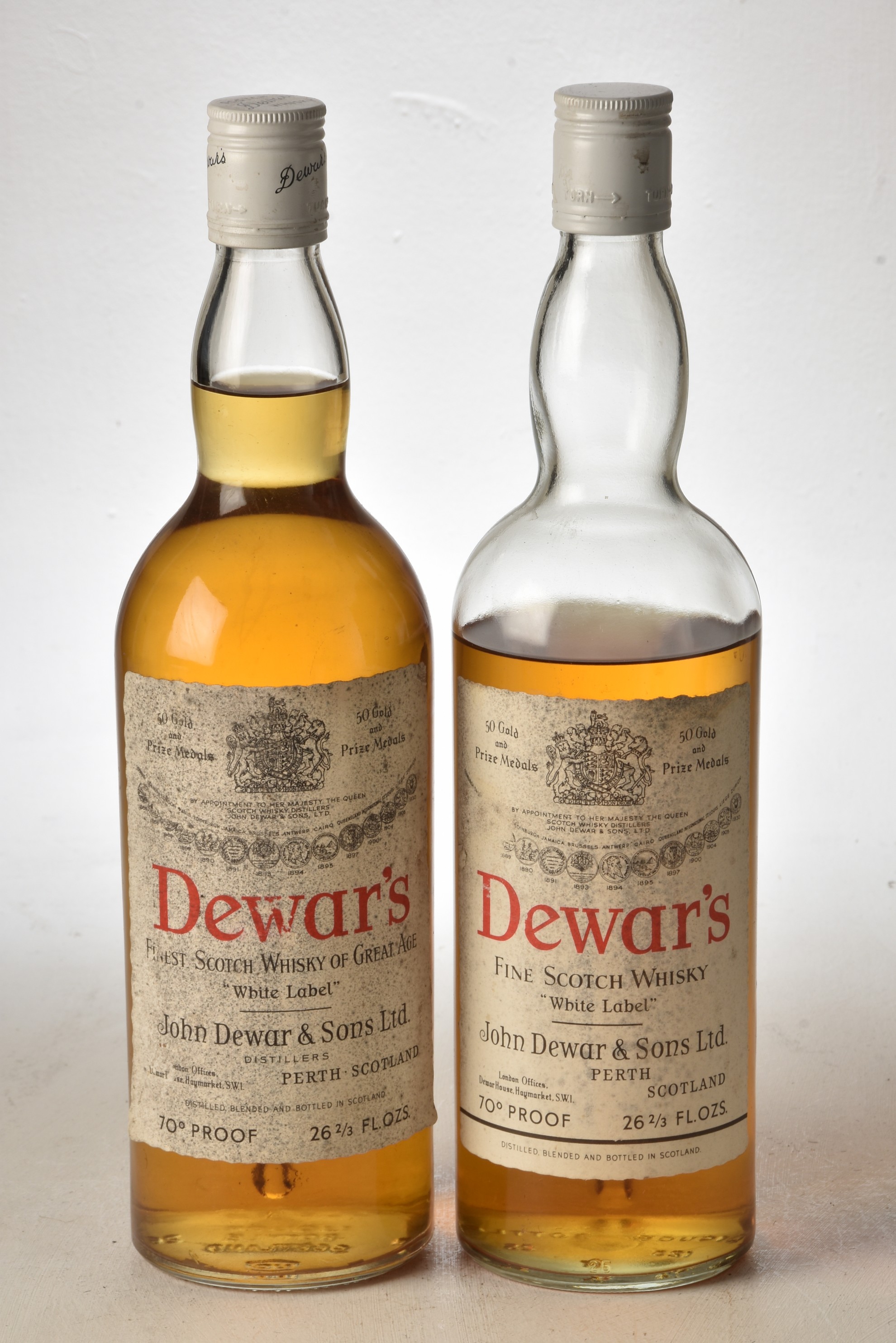 Dewars White Label 1960's bottling 26 2/3rds Fl Oz 70% proof 2 bts 1 with significant evaporation