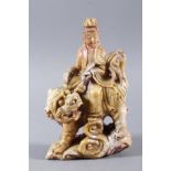 Bodhisattva Guanyin (Göttin der Barmherzigkeit) auf einem Tempel-Löwen reitend