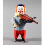 Clown mit Geige von Schuco vor 1945, bezeichnet Schuco Patent