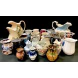 A collection of late 19th century and later jugs, comprising a Crown Devon Fieldings blush ivory