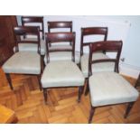 A set of six William iv mahogany dining chairs, stuffed over seats, turned legs, c.1835