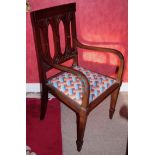 An Art Nouveau mahogany chair, pierced tulip splat back, drop-in seat, tapered legs, spade feet, c.