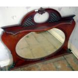 A Victorian mahogany over mantel mirror, oval bevel plate, pierced cresting, 90cm high, 112cm