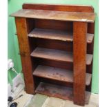 An Arts and Craft oak open book shelf, with open shelves to ends, 99cm high, 76cm wide, 21.5cm deep,