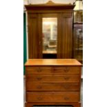 A Victorian Satinwood two piece bedroom suite, wardrobe with arched stepped cornice, panelled front,