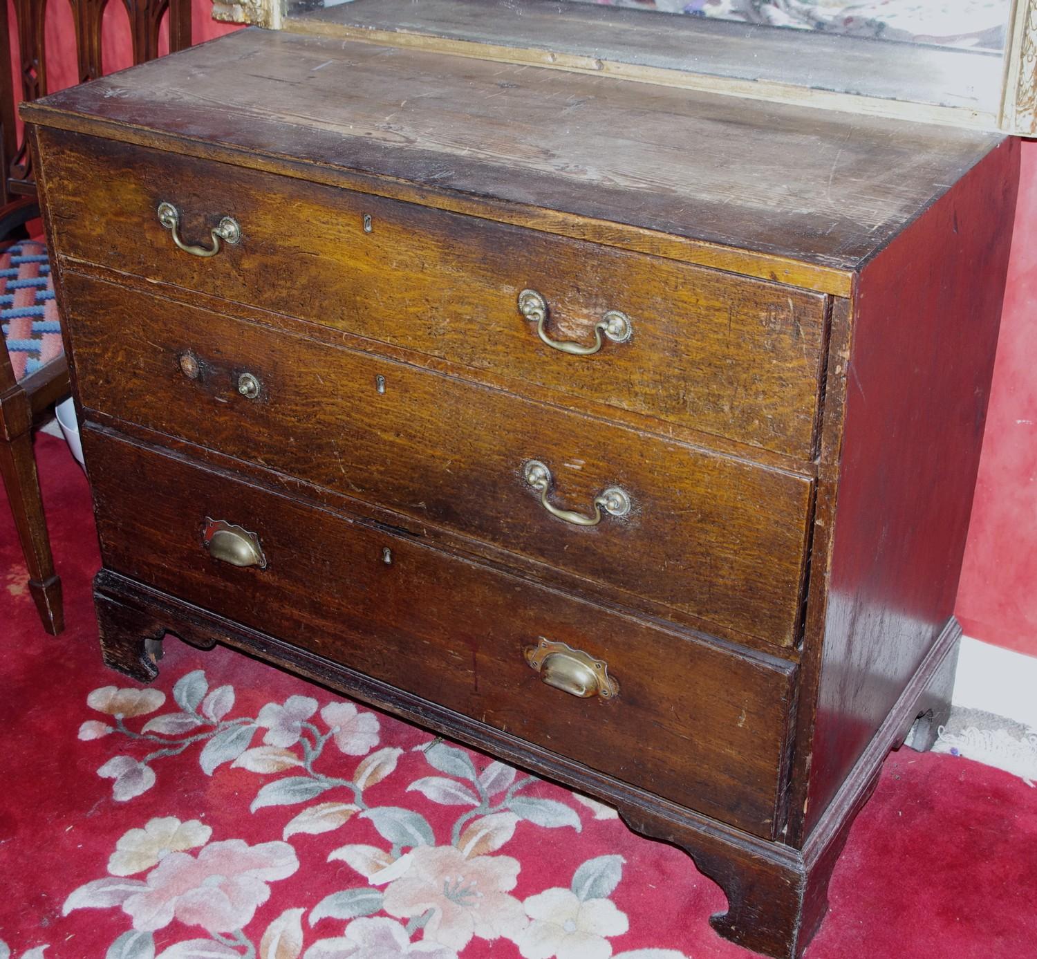 A 19th century oak chest, of three long drawers, bracket feet, 86m high, 108cm wide, 52cm deep, c.