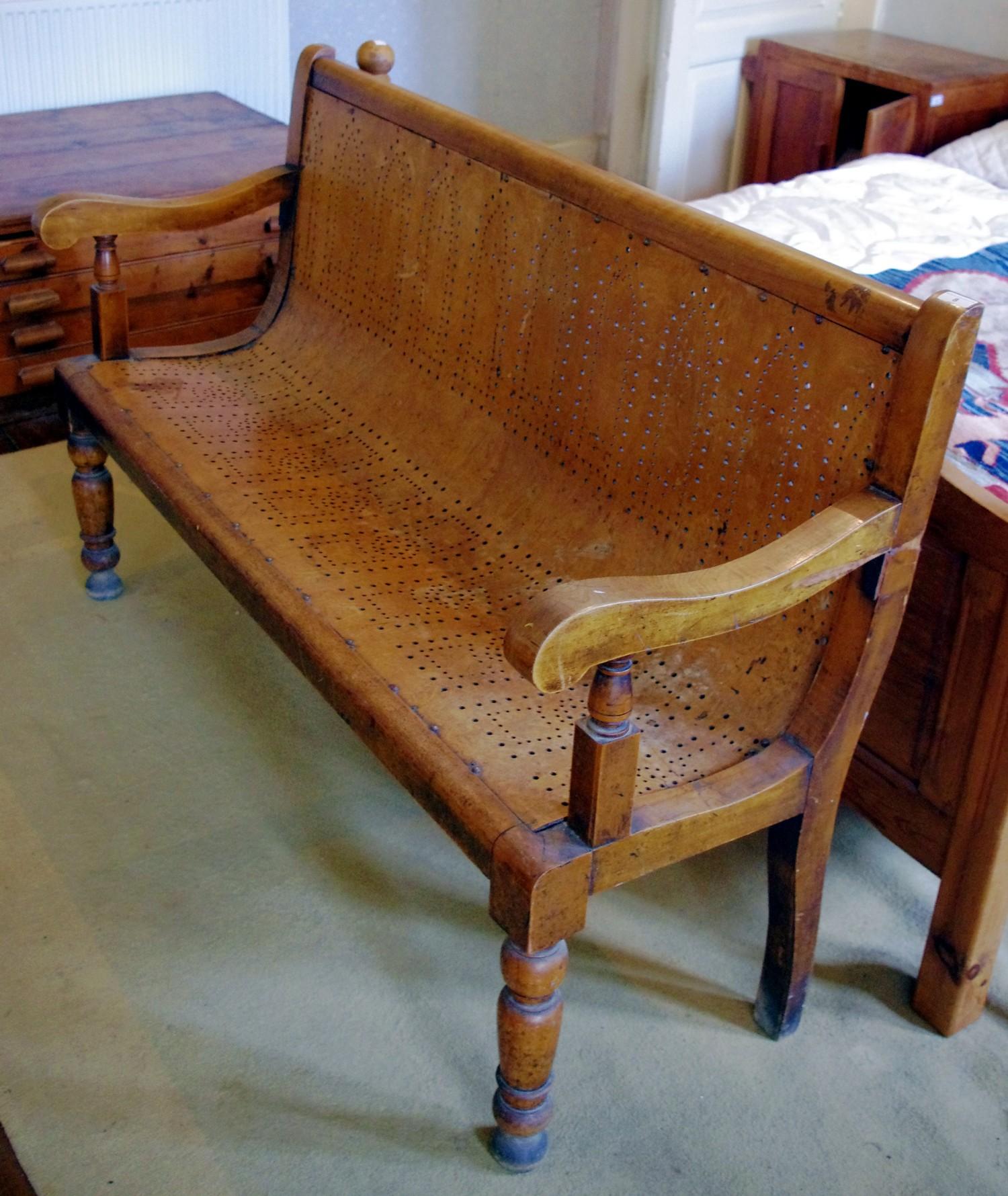 A 19th century oak settle, scroll arms , turned feet, 98cm high, 152cm wide, c.1840