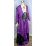A Victorian purple silk and lace dress, on mannequin