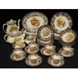 A Royal Worcester Palissy Game Birds series pattern dinner service inc oval and round dinner plates,