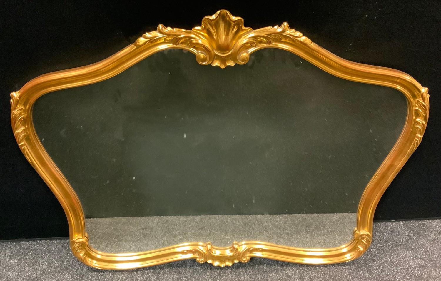 A large gilt framed mirror, shell and leaf cresting, 100cm x 76cm