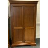 A Willis & Gambier double wardrobe, 197cm high, 116cm wide, 64cm deep