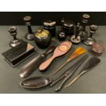 An extensive matched ebony dressing table set, part silver mounted inc ring tree, hair tidy, two