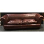 A Tetrad Blake brown leather two seat settee.