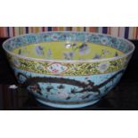 A large early 20th century Chinese Punch bowl, the exterior with scrolling dragon a turquoise