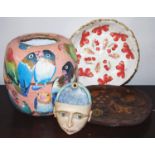 An unusual papier mache vase, painted with colourful parrots, 26cm high; a similar bowl, with