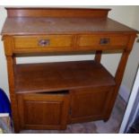 A late 19th century oak buffet, two drawers above open shelf and two cupboard doors, 110cm high,