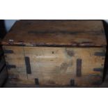 A late 19th century pine and metal bound travelling trunk, handles to sides, 49cm high, 92cm wide,