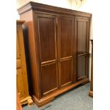 A Willis & Gambier triple wardrobe 197cm high, 174cm wide, 64cm deep