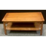 A Rossmore by Sherry Legacy collection rectangular oak coffee table, seven plank top, tapering