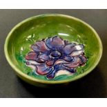 A Moorcroft anemone pattern footed dish, impressed marks