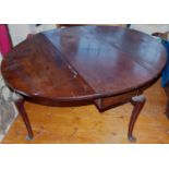 An 18th century red walnut drop leaf table, cabriole legs, pointed pad feet, 138cm wide, 118cm long,