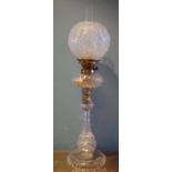 A Victorian glass and brass oil lamp, frosted globular shade, 74cm, high, c.1870