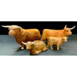 A Beswick Highland Bull no.2008, printed and painted marks; A Beswick Highland Cow & Calf printed