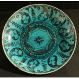 A 19th century blue glazed Islamic dish