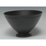 A Wedgwood black basalt deep bowl, designed by Keith Murray, spreading circular foot rim, 16.5cm