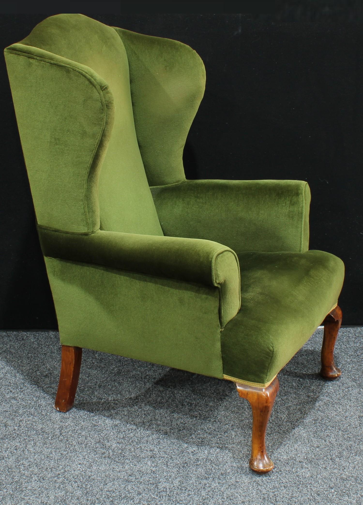 A George II style wing back arm chair, scroll arms, cabriole legs, pad feet, 119cm high. - Image 2 of 3