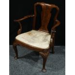A Queen Anne design mahogany open armchair, of broad proportions, 'cupids bow' cresting rail,