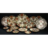 A Royal Crown Derby 2451 pattern shaped circular plate, 21.5cm diameter, another circular, seconds