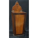 A George III mahogany and oak candle box, hinged sloping cover, 47cm high, c.1800