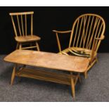 A 1960s Ercol open arm chair, 75cm high; a similar Ercol elm side chair, 79cm high; a similar elm