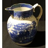 A large George III blue and white jug, Pocock and Allen 1802