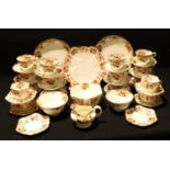 A Staffordshire Radfordian Imari palette tea set for twelve, comprising twelve teacups, saucers