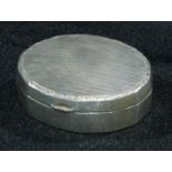 An early 20th century Sterling silver snuff box, hinged engine turned cover, c.1920