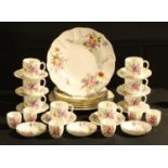 A Royal Crown Derby Posie pattern set of eight coffee cups and saucers, a pair of dinner plates,