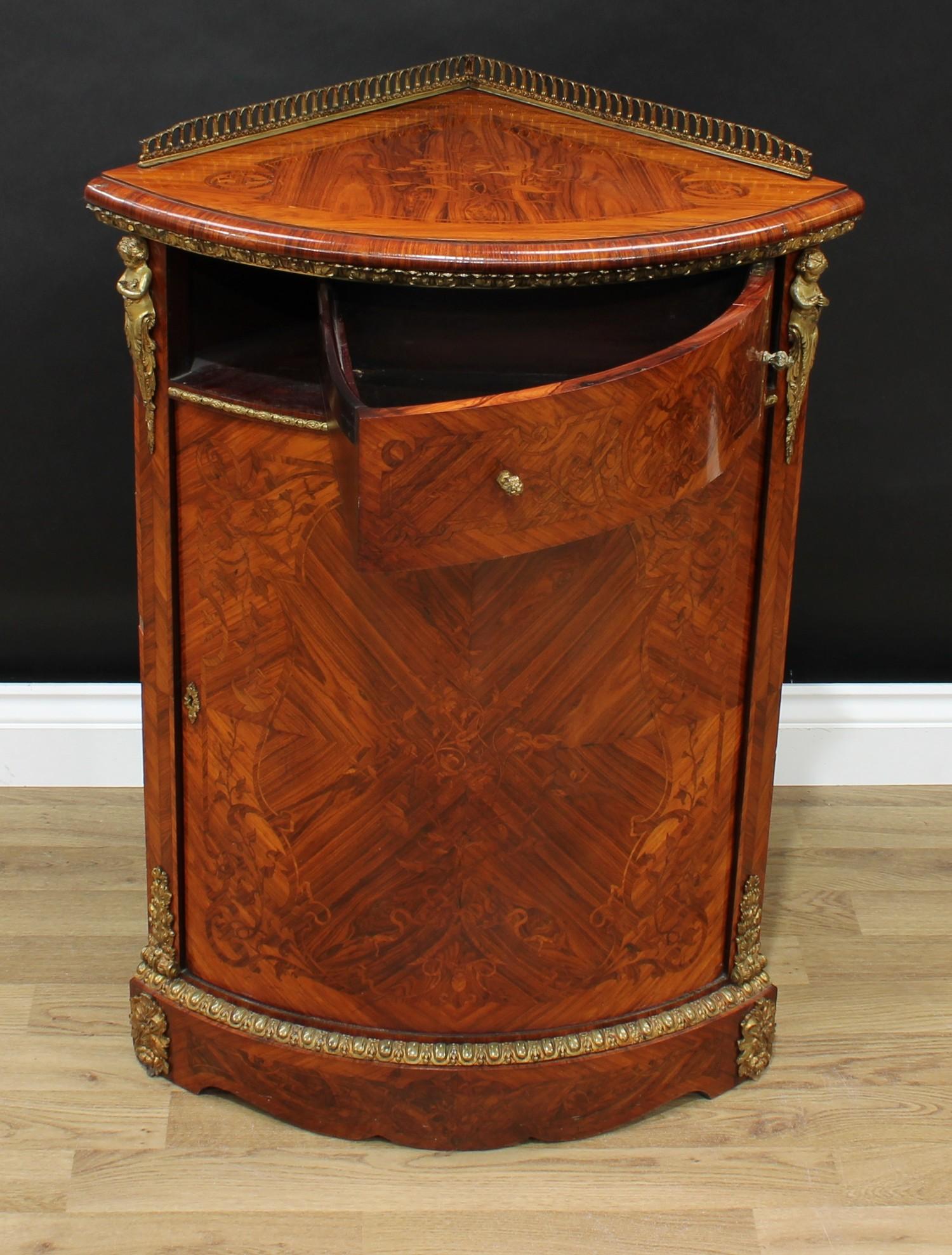 A French Louis XVI Revival gilt metal mounted kingwood and marquetry corner floor cabinet, pierced - Image 2 of 3