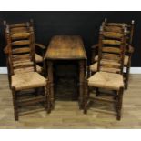 An 18th century style oak gateleg dining table, oval top, the underframe with shaped end supports,