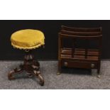 A Victorian rosewood adjustable piano stool, circular padded top, tulip turned support, cabriole and